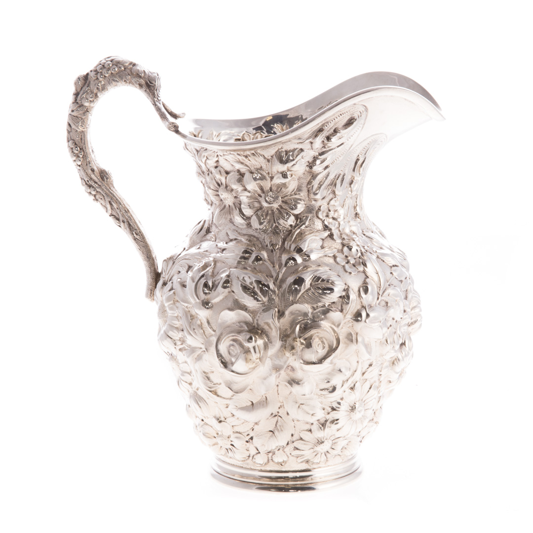 Appraisal: Stieff Rose repousse sterling water pitcher date mark with three