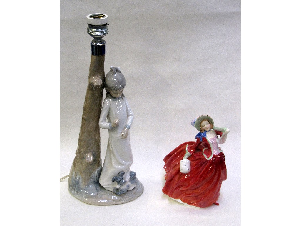 Appraisal: Nao figural lampbase and a Royal Doulton figure 'Autumn Breezes'