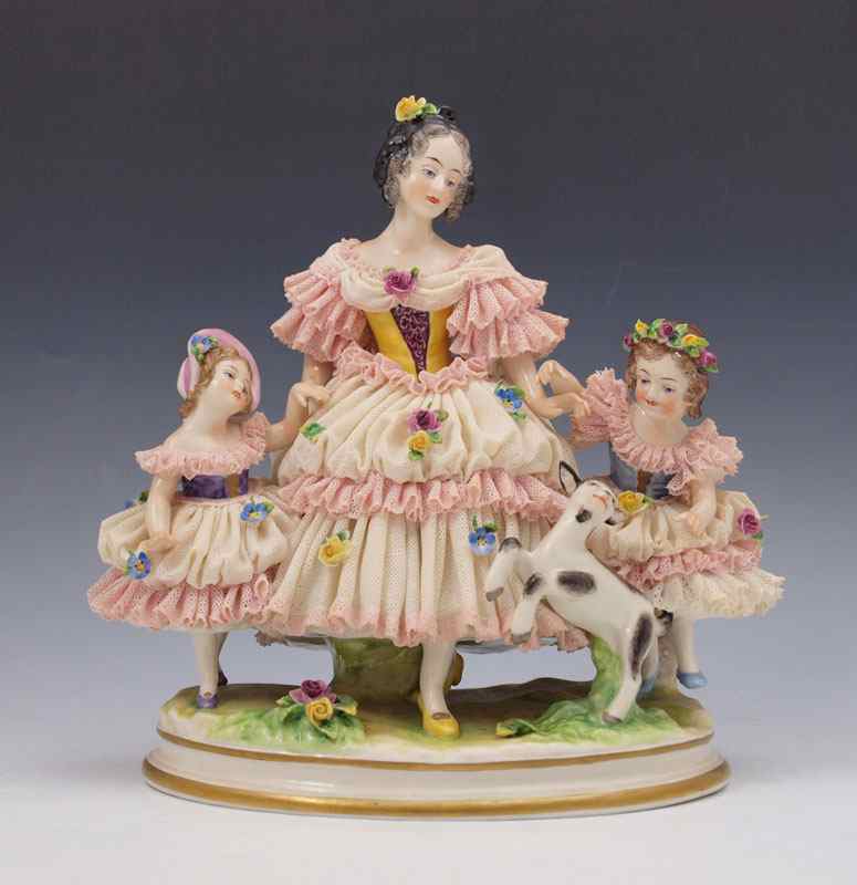 Appraisal: VOLKSTEDT LACY FIGURINE GROUP Figural group of woman with children