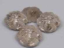 Appraisal: Four Russian hallmarked silver Art Nouveau buttons approx cm diameter