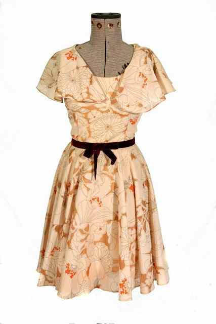 Appraisal: A s RUSSELL STUART DRESS with brown and orange floral