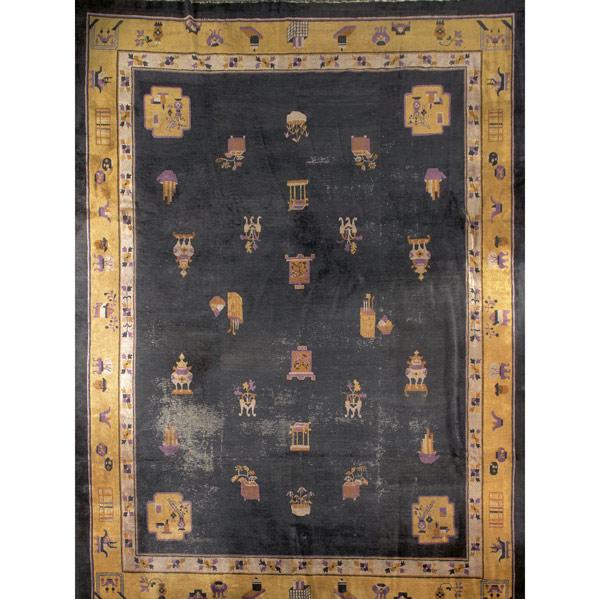 Appraisal: CHINESE RUG With black background and gold border th C