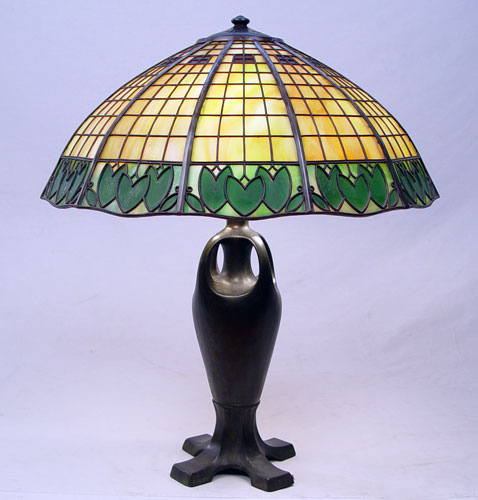 Appraisal: HANDEL THREE LILY PADS TABLE LAMP panel shade over a