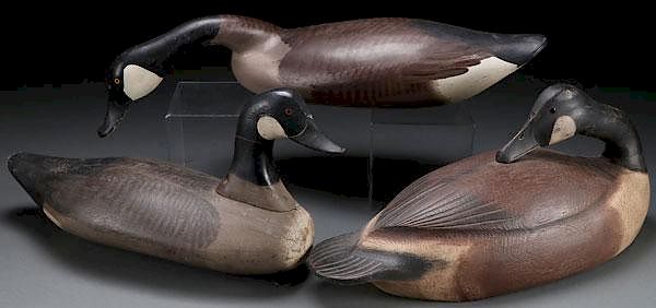 Appraisal: THREE CARVED AND PAINTED WOOD GEESE DECOYS THREE CARVED AND