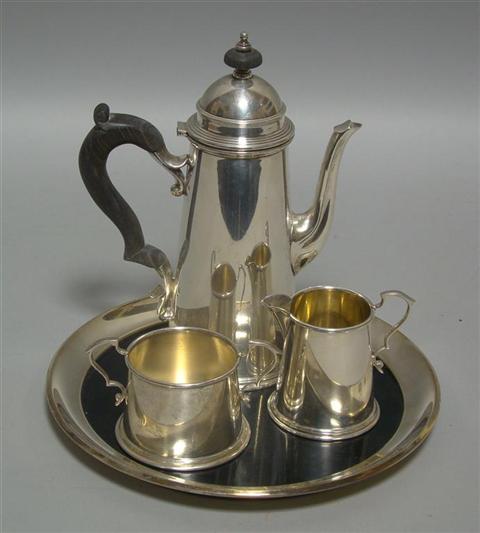 Appraisal: AMERICAN SILVER DEMITASSE SET Including a bullet-form coffee pot with