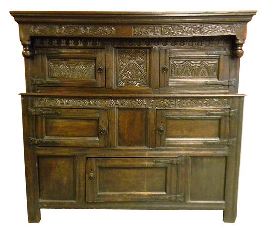 Appraisal: English court cupboard dated in upper border oak with dark