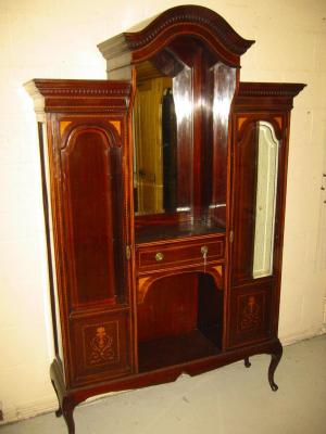 Appraisal: A LATE VICTORIAN MAHOGANY DISPLAY CABINET of stepped oblong form