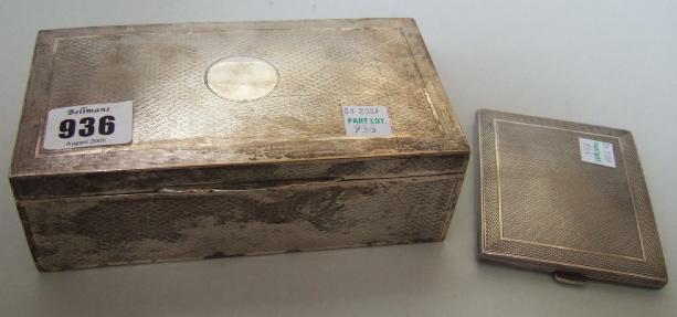 Appraisal: A silver rectangular table cigarette box the exterior with engine