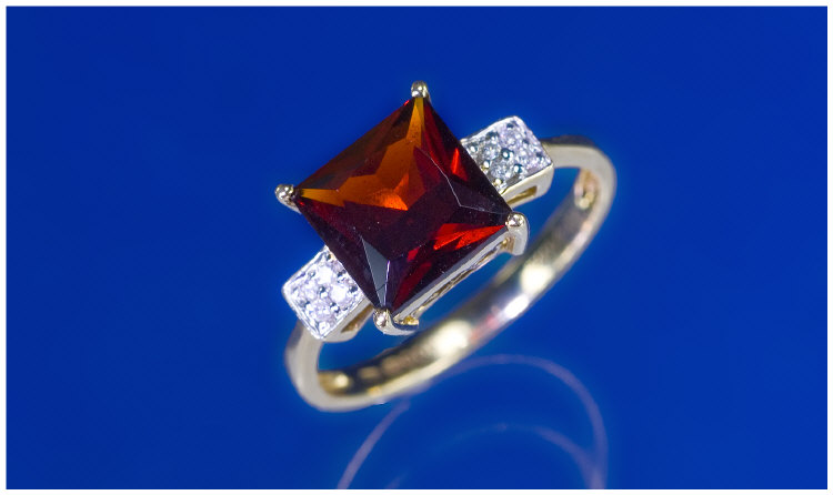 Appraisal: ct Gold Diamond And Garnet Ring Central Princess Cut Garnet