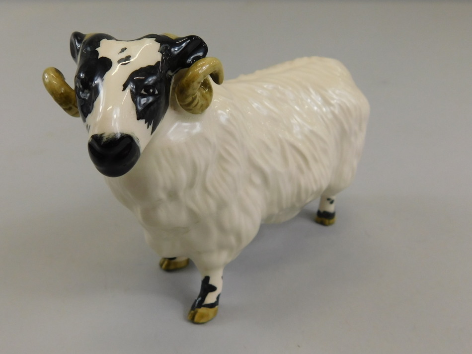 Appraisal: A Beswick black faced ram model number black and white