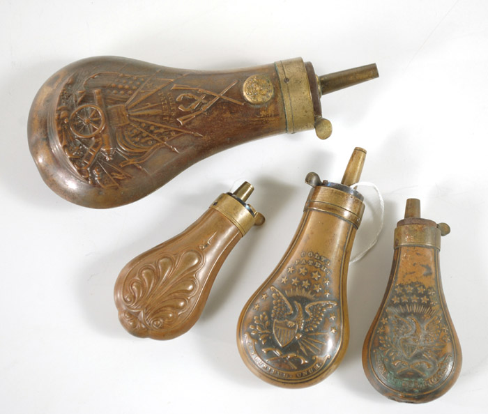 Appraisal: FOUR SMALL SIZE POWDER FLASKS two are marked Colts patent