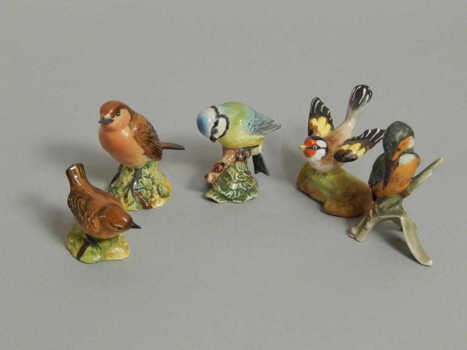 Appraisal: Five various bird ornaments to include a Beswick Blue Tit