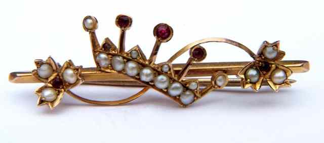 Appraisal: A CT GOLD BAR BROOCH with stylised pearl and ruby