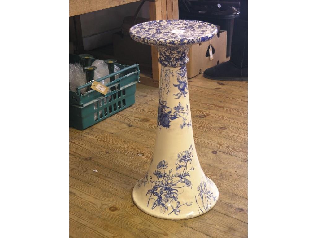 Appraisal: A Victorian Doulton earthenware jardiniere stand printed with flowers in