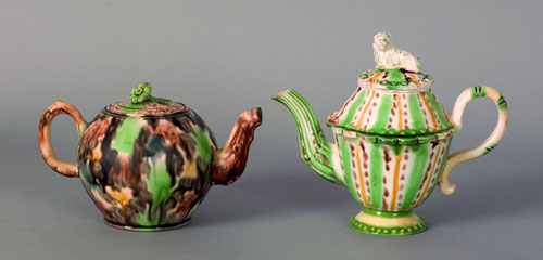 Appraisal: Two tortoiseshell glaze Staffordshire teapots late th c h and