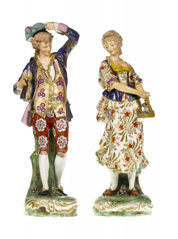 Appraisal: A PAIR OF FRENCH PORCELAIN FIGURES the young woman carrying