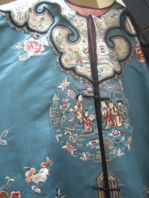 Appraisal: A light blue satin informal robe with peling collar late