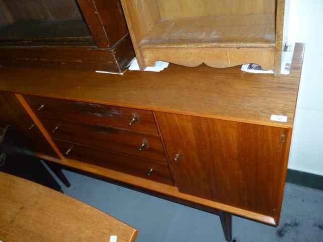 Appraisal: A MID TH CENTURY GORDON RUSSELL SIDEBOARD the three central