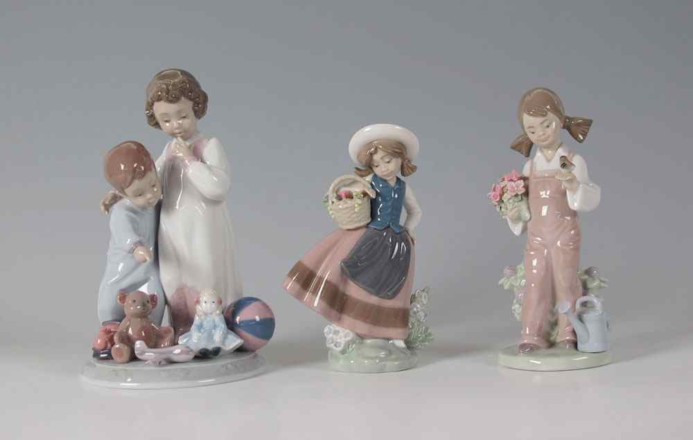 Appraisal: THREE LLADRO PORCELAIN FIGURINES To include THANK YOU SANTA glazed