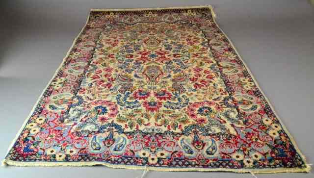 Appraisal: Oriental Prayer RugWith multiple colors on cream ground floral decoration