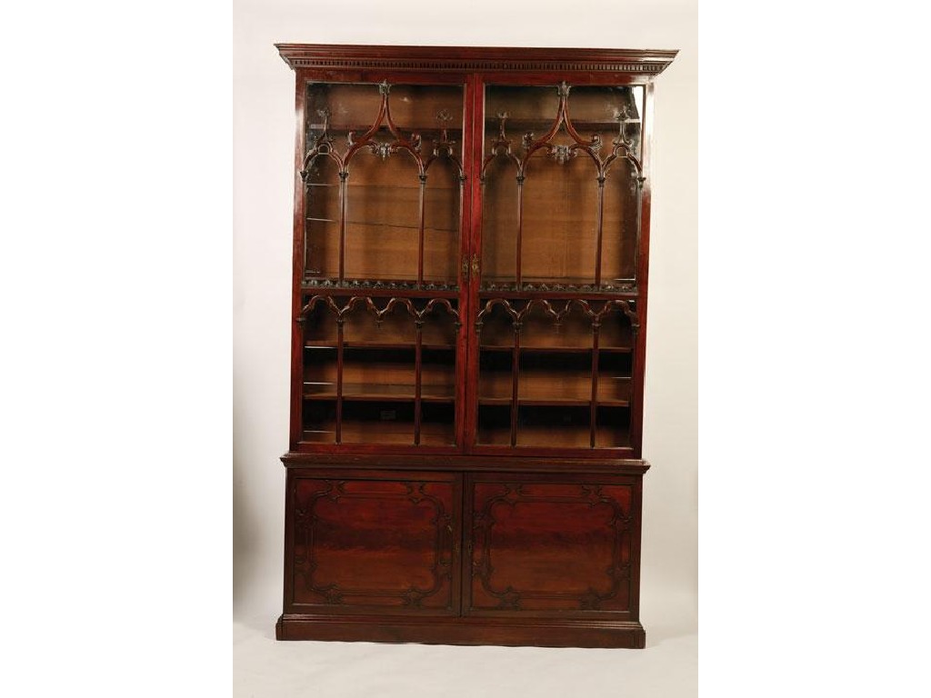 Appraisal: A GEORGE III MAHOGANY LIBRARY BOOKCASE of Chinese Chippendale design