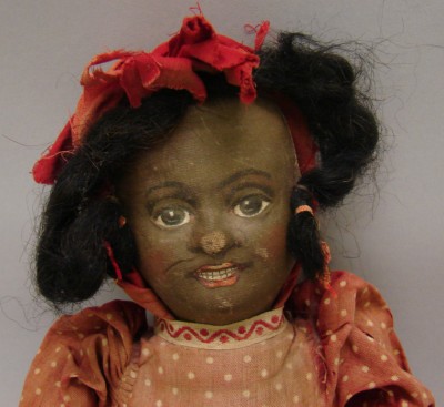 Appraisal: Black Bruckner Rag Doll Stiffened mask face with soft cloth