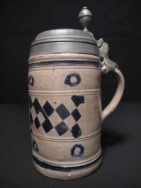 Appraisal: th century blue decorated salt glazed stoneware pewter beer stein