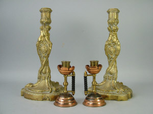 Appraisal: A pair of brass Louis VXI style candlesticks th century