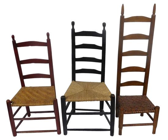 Appraisal: Three th C ladder back side chairs with box stretchers