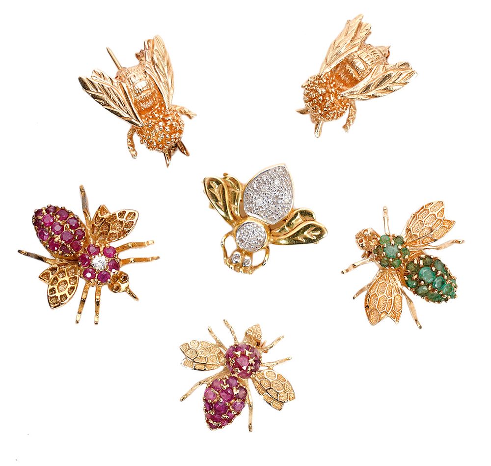 Appraisal: Bee Brooches K w Rubies Emeralds Diamonds bee brooches in