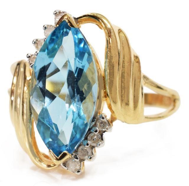 Appraisal: Estate kt yellow gold ring marquise-cut blue stone possibly topaz