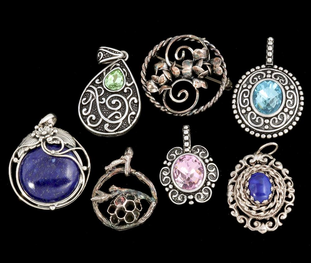 Appraisal: AN ESTATE COLLECTION OF SILVER PENDANTS Six silver pendants and