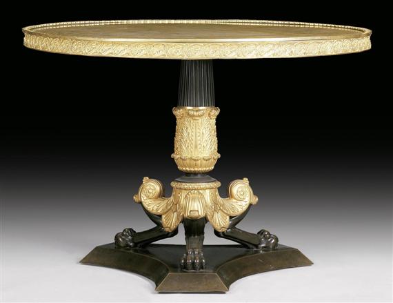 Appraisal: ROUND SALON TABLE AUX PATTES DE LIONS Empire Paris circa