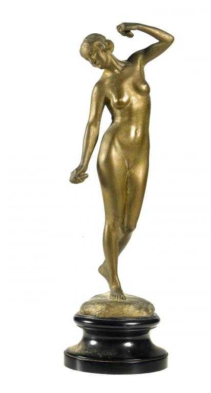 Appraisal: A GILT BRONZE STATUETTE OF A YOUNG WOMAN playing the