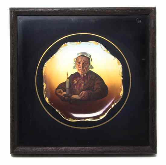 Appraisal: A Continental Porcelain Portrait Plate depicting an elderly woman with