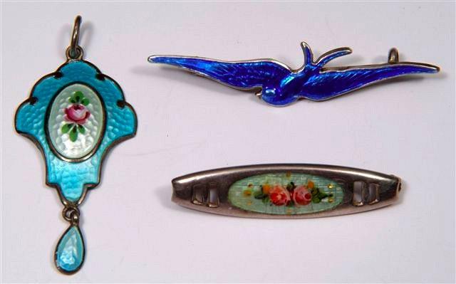 Appraisal: A BLUE ENAMELLED SILVER SWALLOW BROOCH by Charles Horner an