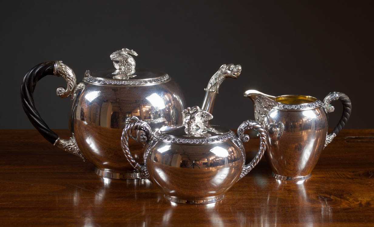 Appraisal: THREE PIECE GERMAN FINE SILVER TEA SET with swan finials