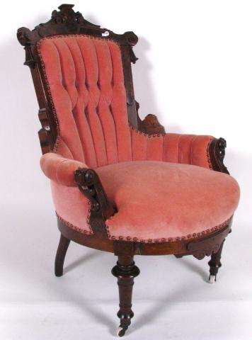 Appraisal: Victorian walnut upholstered arm chair Eastlake period mauve upholstery with