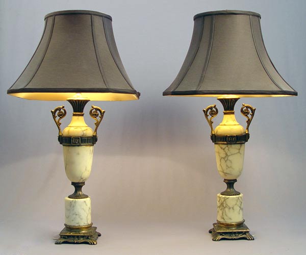 Appraisal: DECORATIVE PAIR OF MARBLE LAMPS Metal mounted marble urn type