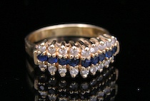 Appraisal: A Sapphire And Diamond Fancy Band A sapphire and diamond