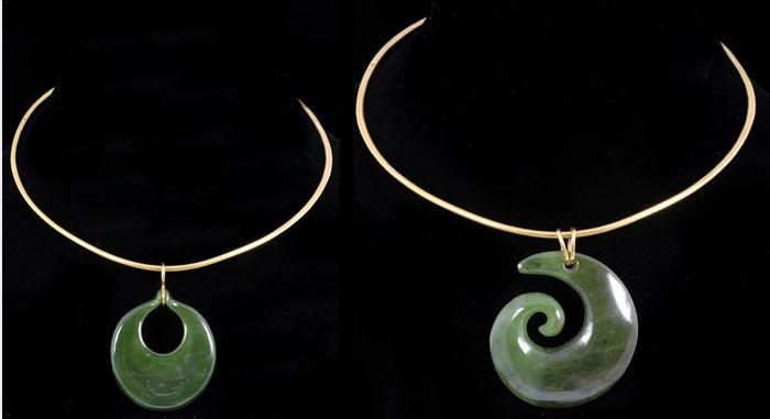 Appraisal: Two Interchangeable Carved Jade Pendants