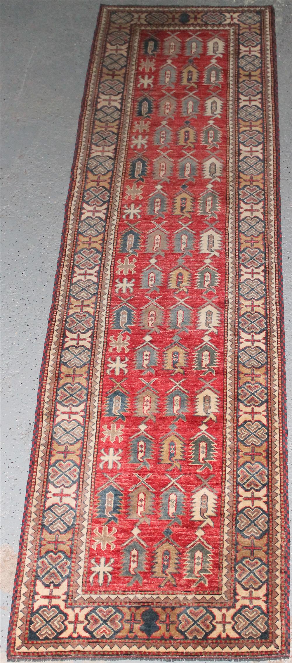 Appraisal: TRIBAL WOOL RUG approx ' x ' wool with a