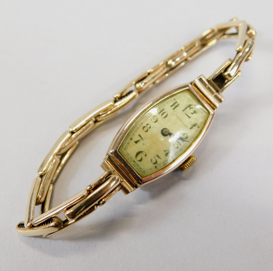 Appraisal: A 's wristwatch with ct gold watch head on gold