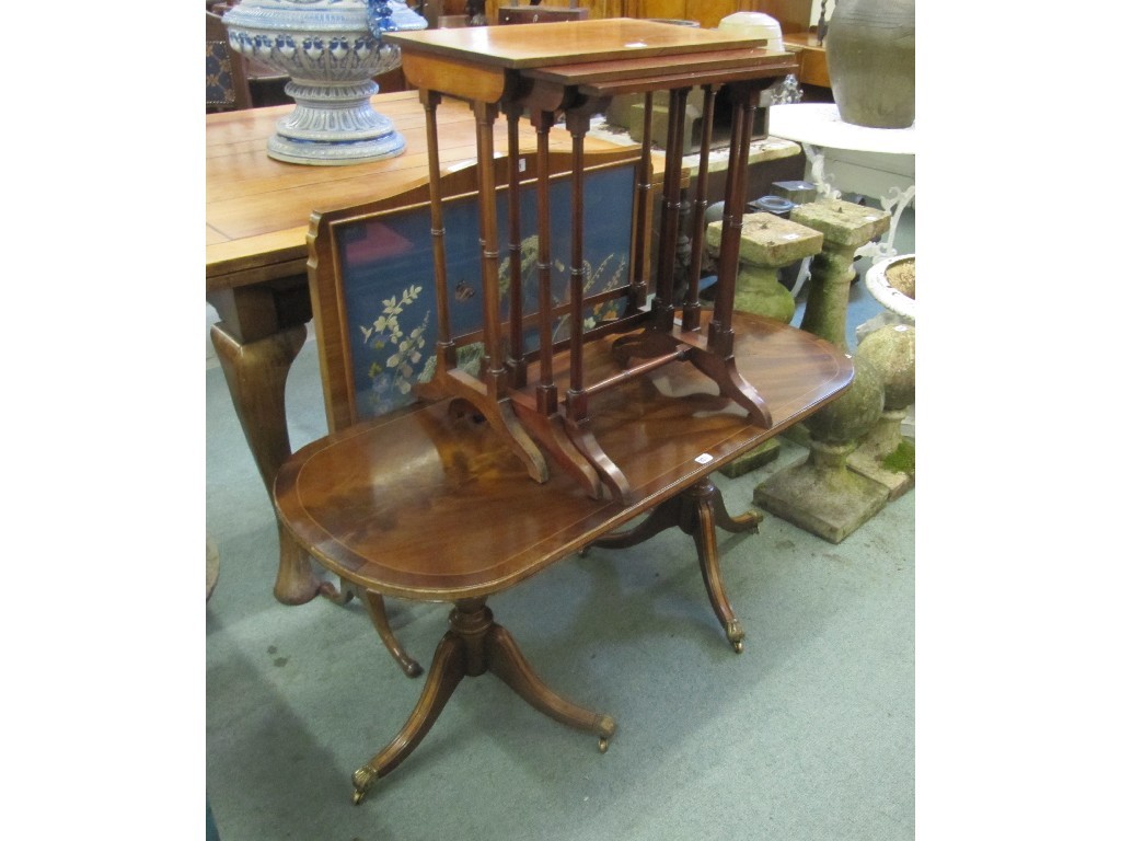 Appraisal: Mahogany firescreen with embroidered panel mahogany nest of three tables