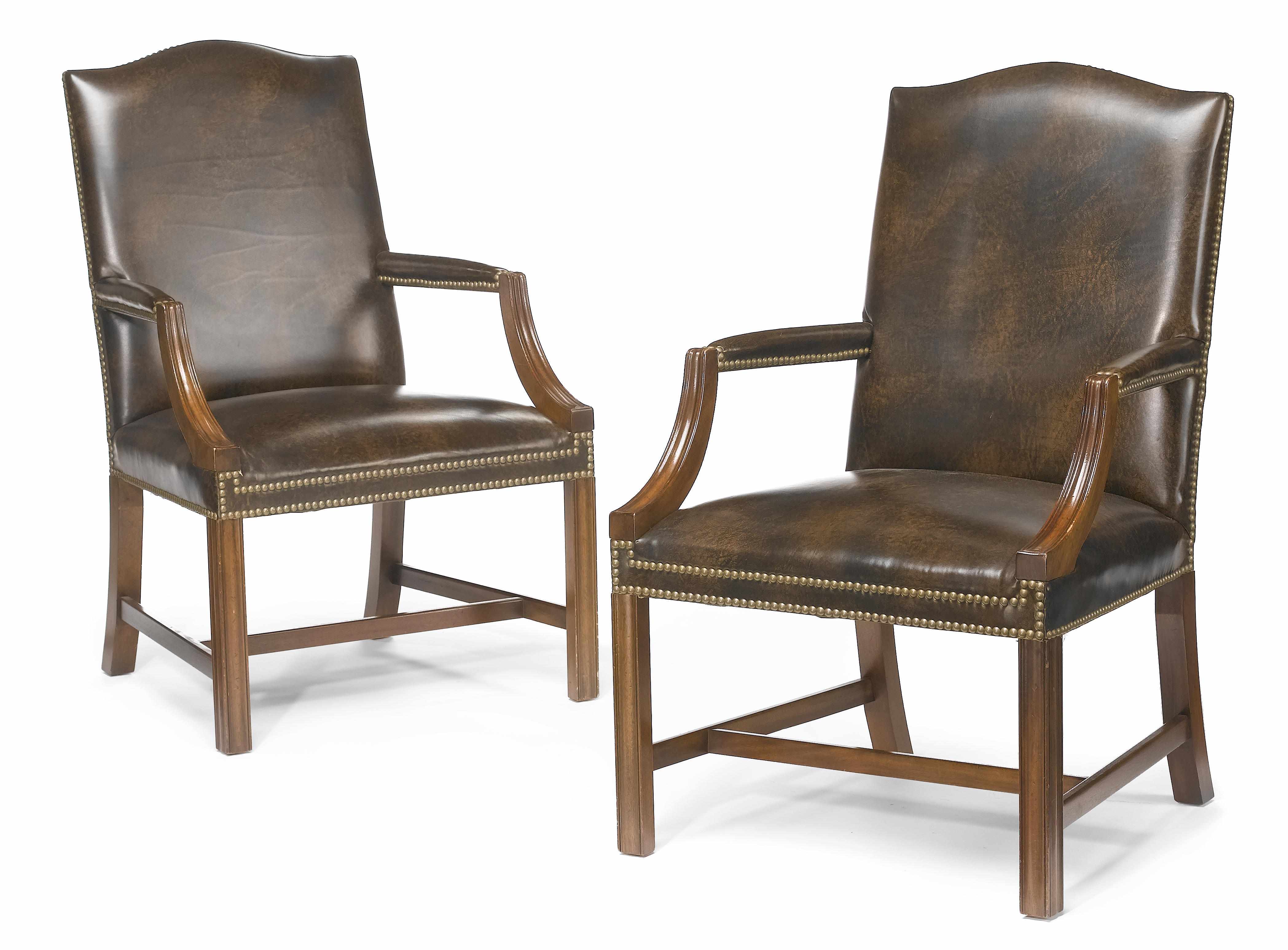 Appraisal: A pair of George III style mahogany library armchairs th