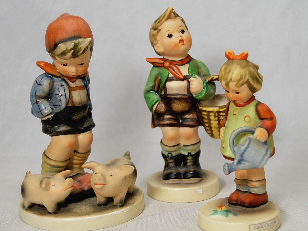 Appraisal: Three Hummell figure groups - Boy with two piglets 'Village