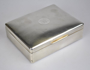 Appraisal: An engine-turned silver cigarette box with cedar lining Sampson Mordon