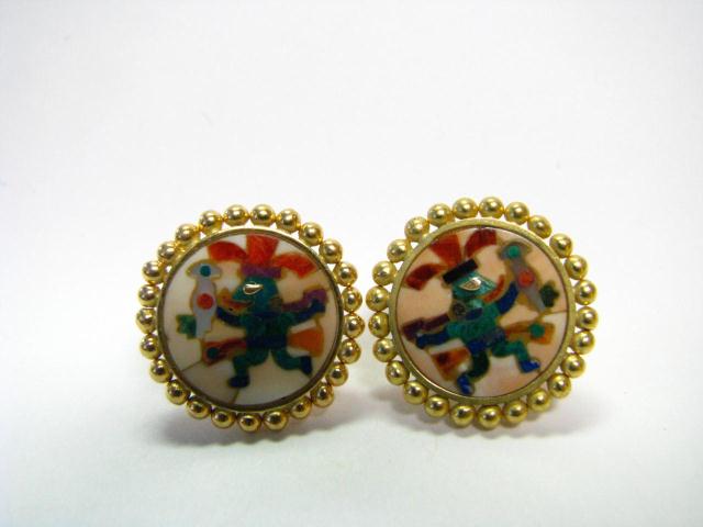 Appraisal: Pair of K yellow gold inlaid earrings depicting mythical tribal