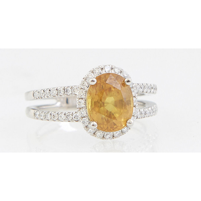 Appraisal: Lady's Platinum Dinner Ring with a ct oval yellow sapphire