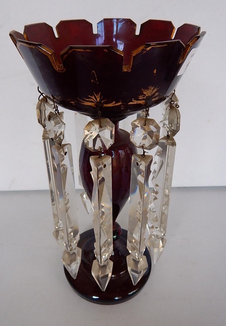 Appraisal: A Victorian ruby glass lustre vase with slender baluster stem